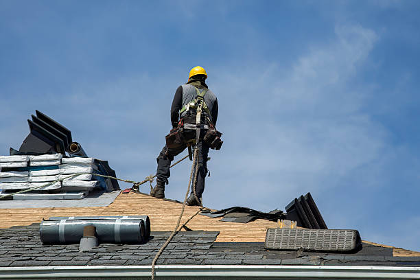 Professional Storm Damage Roof Repair technician working in Enfield, CT